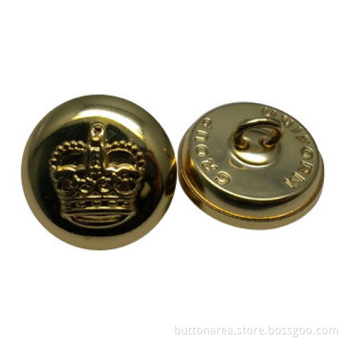 Metal button with shiny gold, made of brass